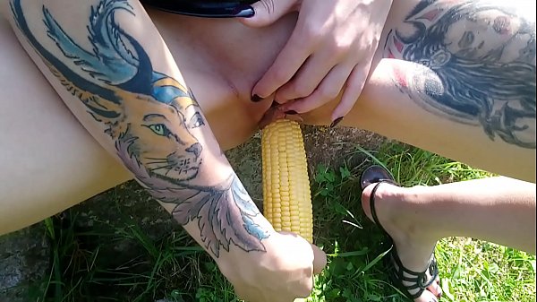 Lucy Raven fucking pussy with corn in public