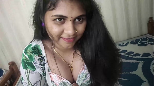 Niña india en la cama con su amante, compartiendo besos suaves y toques juguetones