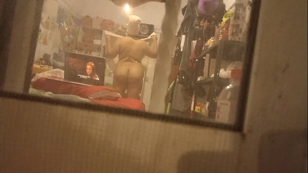 My aunt left the curtains open and I was able to record her while she was getting dressed after the shower